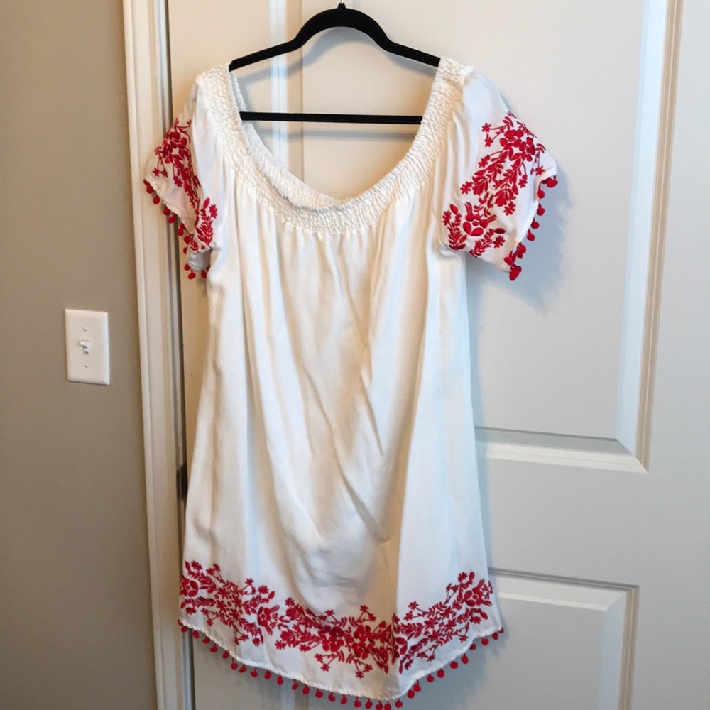 White off the shoulder dress with red embroidery
